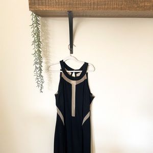Black evening gown with illusion detailing